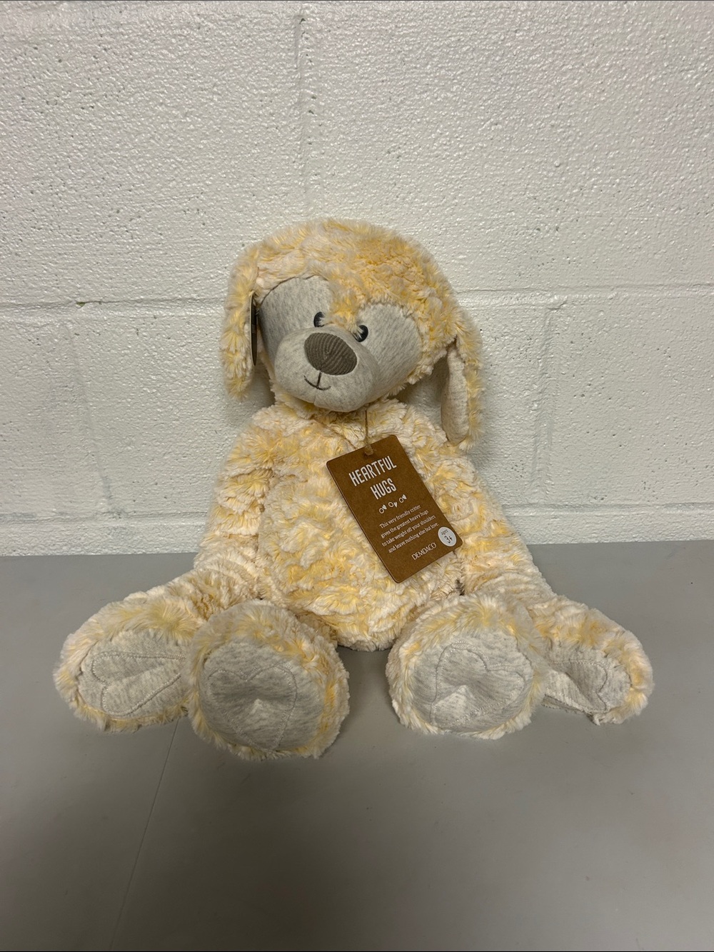 Demdaco weighted plush Heartful hugs dog
